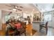 Open concept kitchen and dining area with white cabinets and a view into the living area at 4442 Academy St, Acworth, GA 30101