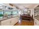 Bright kitchen and dining area featuring white cabinets, stainless steel appliances, and an open concept design at 4442 Academy St, Acworth, GA 30101