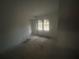 Bedroom with double window letting in lots of natural light at 481 Hammond Dr, Atlanta, GA 30328