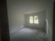 Bedroom with double window letting in lots of natural light at 481 Hammond Dr, Atlanta, GA 30328