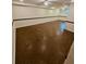 Basement featuring a painted floor, white walls with dark trim, and ceiling fan lights at 713 Trickum Valley Dr, Woodstock, GA 30188