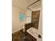 Elegant bathroom showcasing slate floors, jacuzzi tub, and an outdoor view at 713 Trickum Valley Dr, Woodstock, GA 30188