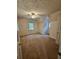Bedroom featuring neutral walls, carpet, and two windows providing plenty of natural light at 713 Trickum Valley Dr, Woodstock, GA 30188