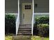 Close-up view of the home's front door, showcasing the welcoming entrance and details at 713 Trickum Valley Dr, Woodstock, GA 30188