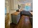Stylish kitchen featuring butcher block countertops, ample cabinet storage and modern appliances at 713 Trickum Valley Dr, Woodstock, GA 30188