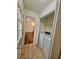 Convenient laundry area adjacent to living room with modern washer and dryer units at 713 Trickum Valley Dr, Woodstock, GA 30188