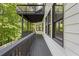 Back deck of home with multi-level design and privacy in a treed lot at 135 Emerald Ln, Roswell, GA 30075