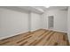 Spacious basement with hardwood flooring ready to be transformed into something spectacular at 135 Emerald Ln, Roswell, GA 30075