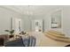 Bright bonus room with stairs, recessed lighting, and multiple entryways, enhancing the spaciousness of the home at 135 Emerald Ln, Roswell, GA 30075