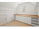 Large walk-in closet with custom shelving and storage space at 135 Emerald Ln, Roswell, GA 30075