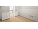 Walk in closet, featuring custom shelving, and ample space for storage at 135 Emerald Ln, Roswell, GA 30075