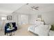 Spacious main bedroom boasts access to the main bathroom, and a cozy sitting area at 135 Emerald Ln, Roswell, GA 30075