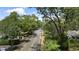 Street view featuring charming homes and lush greenery, providing a serene neighborhood atmosphere at 135 Emerald Ln, Roswell, GA 30075