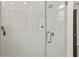 Glass enclosed shower with chrome hardware, white subway tile, and handheld showerhead at 137 Devore Rd, Alpharetta, GA 30009