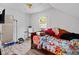Cozy bedroom with sloped ceilings, arched window, and private ensuite at 1876 Madrona Street Nw St, Atlanta, GA 30318