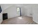 Empty bedroom with modern vinyl floors and arched window at 1876 Madrona Street Nw St, Atlanta, GA 30318