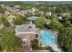 An aerial view showcases the community pool, clubhouse, and tennis courts amidst a lush, green neighborhood at 6430 Banbury Se Ct, Mableton, GA 30126