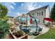 Private backyard featuring a patio, lounge furniture, a pool and a manicured garden at 6430 Banbury Se Ct, Mableton, GA 30126