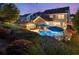 Beautiful backyard with a pool, patio, pergola, and lush landscaping creates a relaxing outdoor space at 6430 Banbury Se Ct, Mableton, GA 30126
