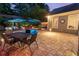 Beautiful backyard with a patio, dining area, in-ground pool, and landscape lighting at 6430 Banbury Se Ct, Mableton, GA 30126