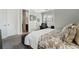An inviting bedroom features neutral walls, white trim, and soft carpet flooring at 6430 Banbury Se Ct, Mableton, GA 30126