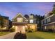 Charming home with a manicured lawn, inviting porch, and two-car garage, perfect for Gathering living at 6430 Banbury Se Ct, Mableton, GA 30126