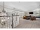 Open-concept living area with a second story view of seating area and comfortable furnishings at 6430 Banbury Se Ct, Mableton, GA 30126