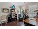 Comfortable home office space featuring a desk, bookcases, and an ergonomic chair at 6430 Banbury Se Ct, Mableton, GA 30126