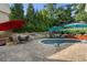 Private backyard pool with outdoor seating at 6430 Banbury Se Ct, Mableton, GA 30126