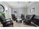 Sitting room with comfortable seating, stylish decor, and ample natural light creating a welcoming atmosphere at 6430 Banbury Se Ct, Mableton, GA 30126