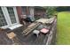 This is a view of the back deck area and door leading inside home from backyard at 1095 Mitchell Crossing Sw Dr, Atlanta, GA 30331