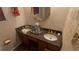 A charming bathroom featuring a double sink, vanity and tasteful decor at 1095 Mitchell Crossing Sw Dr, Atlanta, GA 30331