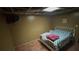 Cozy bedroom featuring comfortable bed and tile floors at 1095 Mitchell Crossing Sw Dr, Atlanta, GA 30331