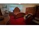 A spacious bedroom featuring an ornate headboard and comfortable bed at 1095 Mitchell Crossing Sw Dr, Atlanta, GA 30331