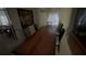 Cozy dining room with a long wooden table and chairs at 1095 Mitchell Crossing Sw Dr, Atlanta, GA 30331