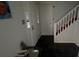 Inviting entryway with dark floors, staircase, and a bright front door at 1095 Mitchell Crossing Sw Dr, Atlanta, GA 30331