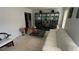 Living room featuring a white sofa, dark display cabinet and a decorative table at 1095 Mitchell Crossing Sw Dr, Atlanta, GA 30331