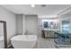 Spa bathroom features a soaking tub and a dual sink vanity at 2123 Garden Cir, Decatur, GA 30032