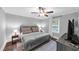Relaxing bedroom with neutral tones, hardwood floors, and a ceiling fan at 2123 Garden Cir, Decatur, GA 30032