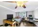 Bedroom featuring ceiling fan, workspace and window views at 2123 Garden Cir, Decatur, GA 30032