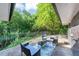 Outdoor patio with seating area to enjoy the lush greenery and nature views at 2123 Garden Cir, Decatur, GA 30032