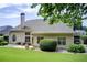 Spacious backyard with lush green lawn, patio seating, and mature trees for outdoor relaxation at 3030 Larkspur Ct, Cumming, GA 30041