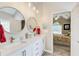 Bathroom with double sink vanity and modern lighting at 3030 Larkspur Ct, Cumming, GA 30041