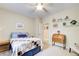 Inviting bedroom with carpet, a ceiling fan, and natural light at 3030 Larkspur Ct, Cumming, GA 30041