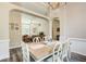 Dining room with hardwood floors that opens to the living room; perfect for entertaining at 3030 Larkspur Ct, Cumming, GA 30041