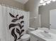 Well-lit bathroom featuring a white vanity with a large mirror at 3153 Morgan Box Ne Ln, Buford, GA 30519