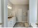 Modern bathroom featuring a white vanity and updated fixtures at 3153 Morgan Box Ne Ln, Buford, GA 30519