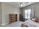 Bedroom with stylish decor, neutral tones, and natural light at 3153 Morgan Box Ne Ln, Buford, GA 30519