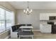 Cozy breakfast nook with built-in seating, stylish lighting, and updated finishes at 3153 Morgan Box Ne Ln, Buford, GA 30519