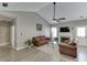 Comfortable living room with fireplace, vaulted ceiling, and wood-look flooring at 3153 Morgan Box Ne Ln, Buford, GA 30519